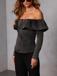 Off-shoulder ruffled denim top by Trendsi featuring a cropped fit and feminine ruffle details on a model.