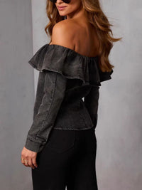 Off-shoulder ruffled denim top from Trendsi featuring a stylish, casual design with ruffle details and a fitted silhouette.