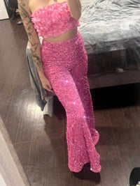 Sequin embellished wide-leg pants from Trendsi featuring shiny sequins and flowing fabric, stylish and eye-catching.