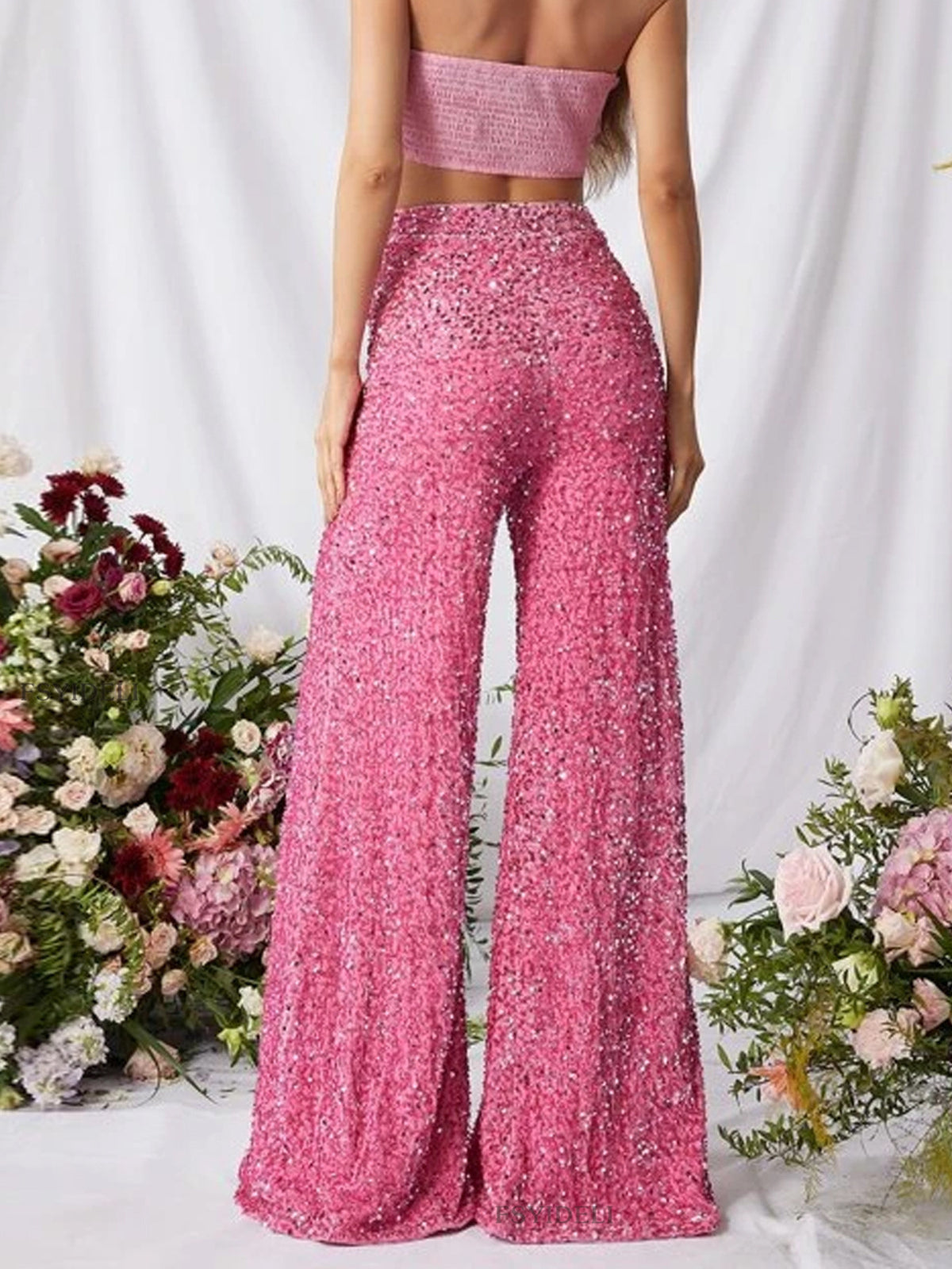 Sequin embellished wide-leg pants from Trendsi with a flowy fit and shimmering sequin details, shown on a model.