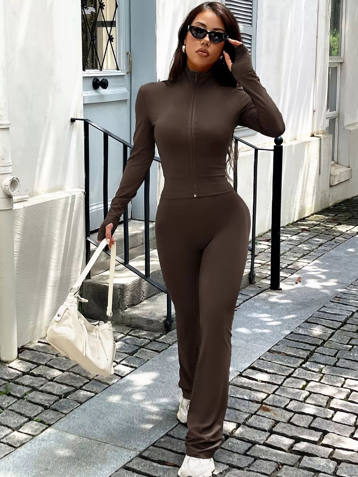 Trendsi zip-up long sleeve active outerwear and pants set, stylish athletic wear for workouts or casual wear, black color.