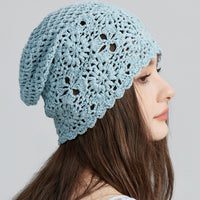 Crochet floral beanie hat by Trendsi featuring colorful flower patterns and a cozy, knitted design for stylish winter wear.