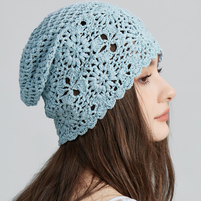 Crochet floral beanie hat by Trendsi featuring colorful flower patterns and a cozy, knitted design for stylish winter wear.