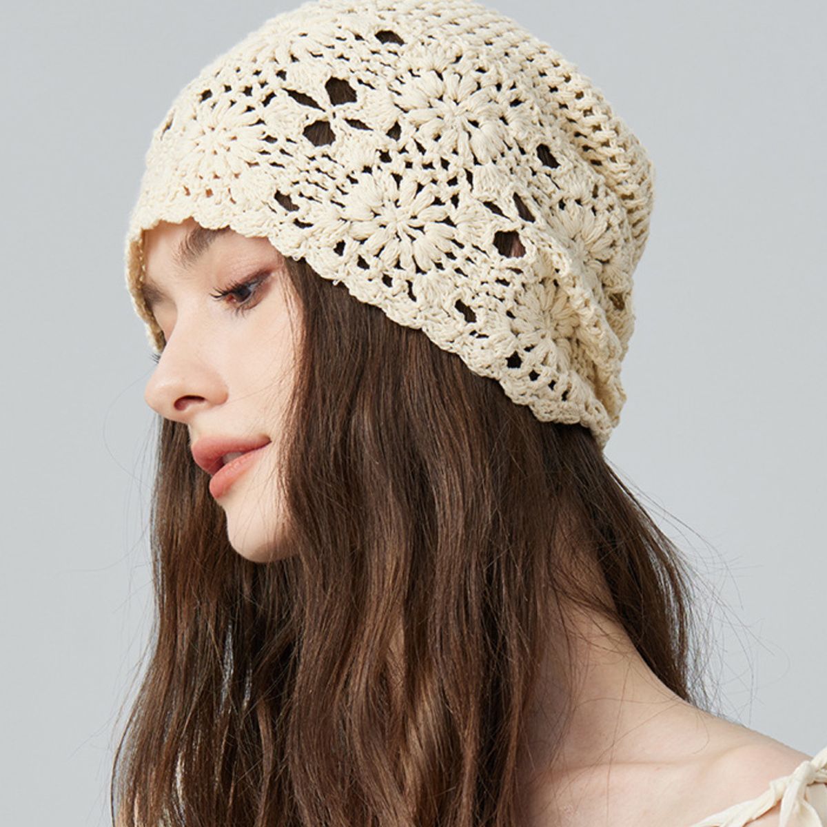 Crochet floral beanie hat by Trendsi featuring colorful floral patterns and a cozy, knitted design.