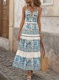 Floral print sweetheart neck maxi dress from Trendsi, flowing fabric with a fitted bodice and vibrant floral pattern.