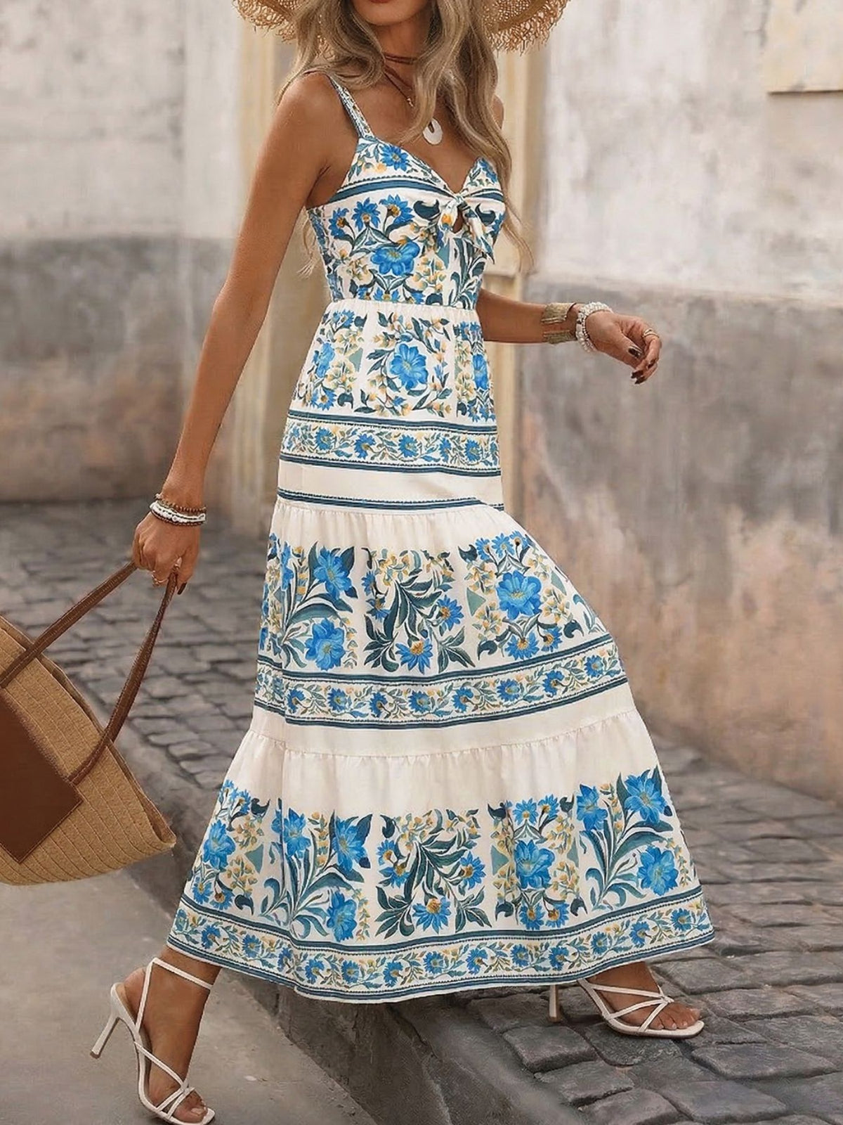 Floral print sweetheart neck maxi dress by Trendsi featuring a flowy silhouette and vibrant flower pattern.