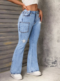 Blue slit star flare leg jeans from Trendsi featuring a stylish star pattern and flared design.