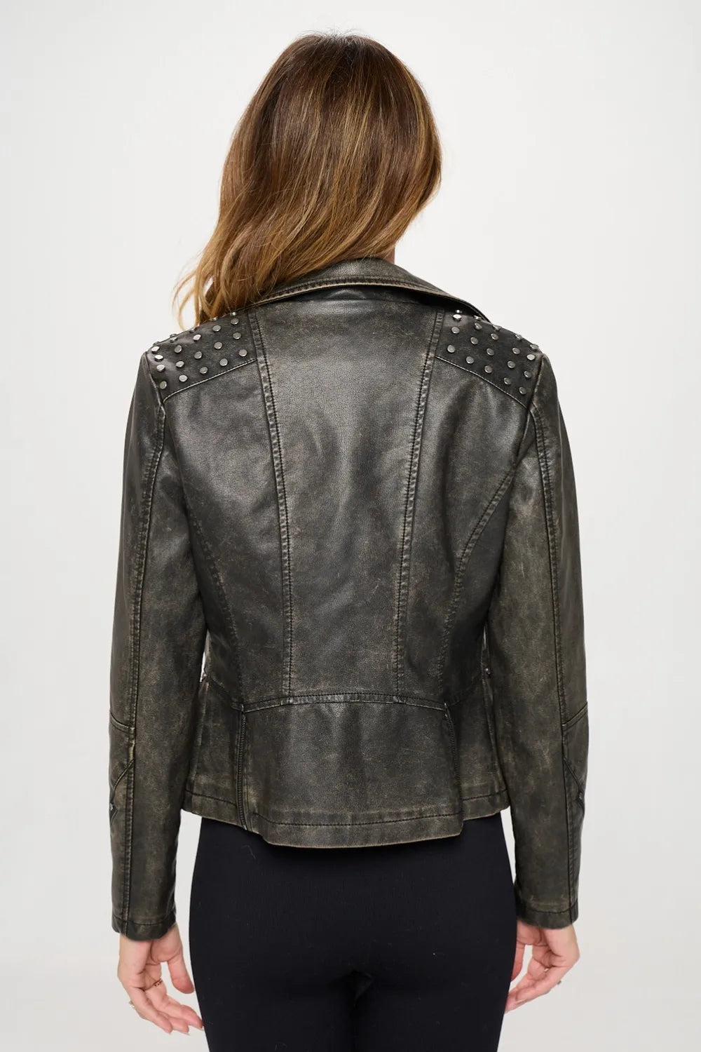 Black faux leather motorcycle jacket with silver studs from Trendsi's Coalition LA Studded Classic Moto collection, featuring a fitted design.