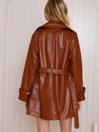 Leather double-breasted jacket from Trendsi featuring a classic design, with visible lapels and button details.