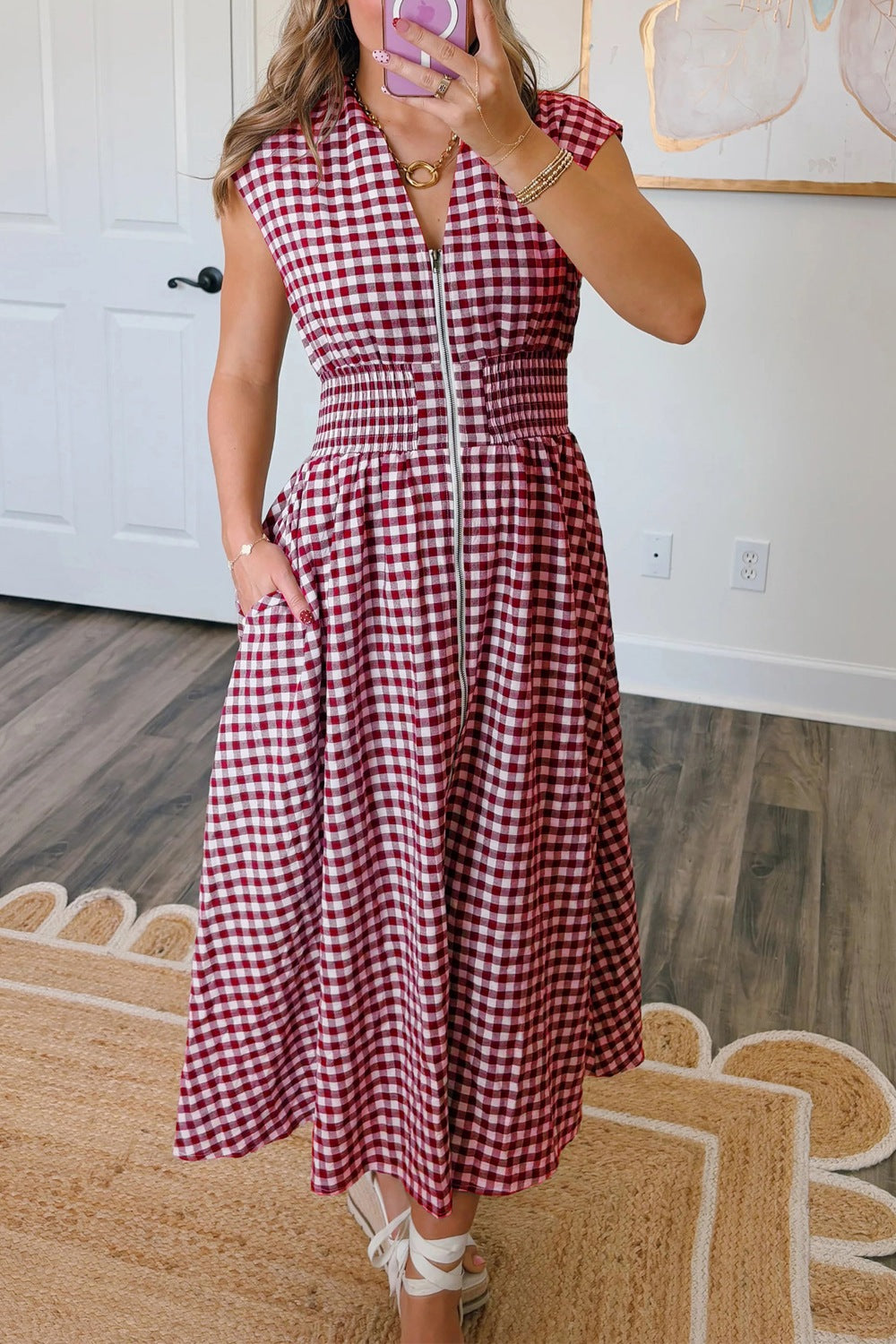 Cerise gingham zip-front midi dress by Trendsi, featuring a stylish front zipper and classic pattern perfect for casual wear.