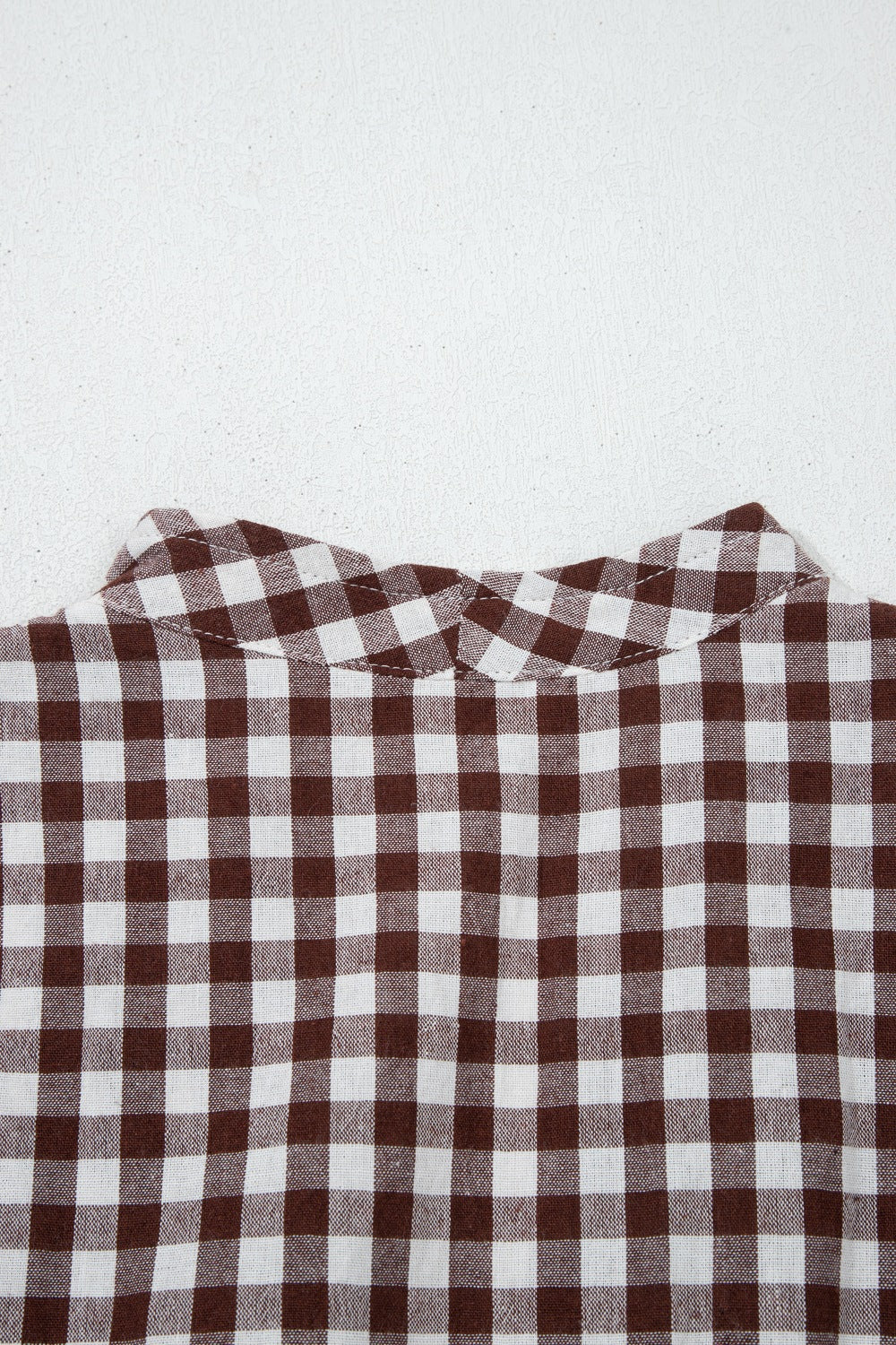 Cerise gingham zip-front midi dress by Trendsi featuring a fitted waist and midi length, perfect for casual or semi-formal wear.
