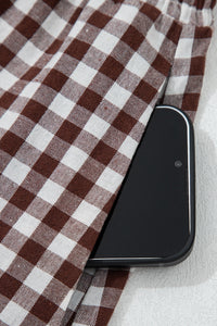 Cerise Gingham Zip-Front Midi Dress by Trendsi, featuring a stylish collar, long sleeves, and a front zipper for a chic look.