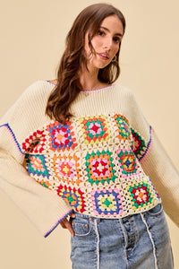 Multi-color granny crochet lace sweater top by Trendsi, featuring intricate lace details and a cozy, stylish design.