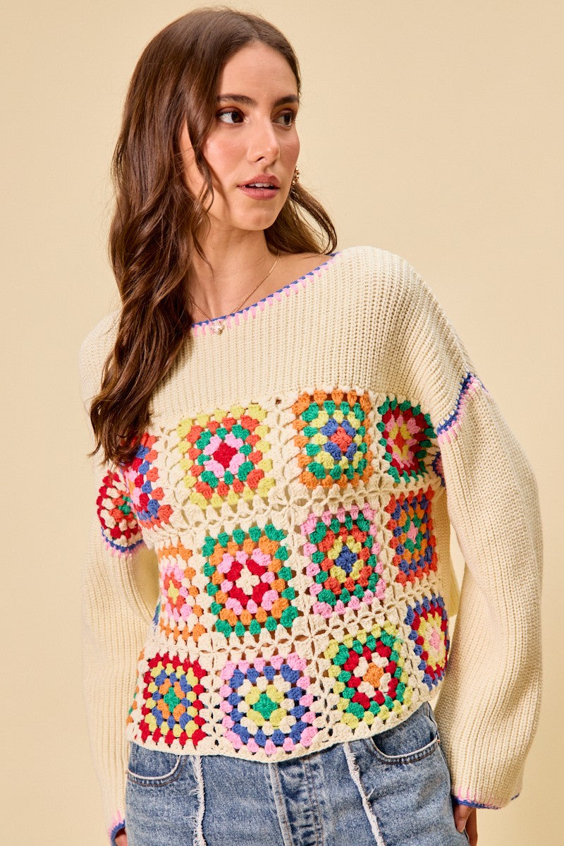Multi-color granny crochet lace sweater top by Trendsi, featuring a stylish, textured crochet design in vibrant hues.