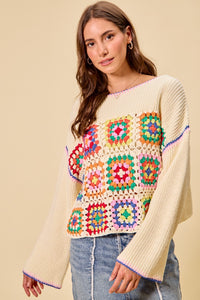 Multi-color granny crochet lace sweater top by Trendsi, featuring intricate lace details and a cozy, stylish fit.