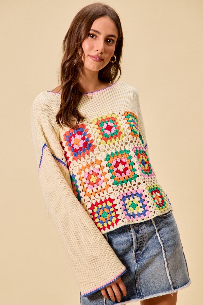 Multi-color granny crochet lace sweater top by Trendsi featuring intricate crochet patterns and a stylish, relaxed fit.
