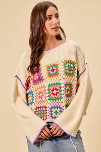 Colorful granny crochet lace sweater top by Trendsi in multiple vibrant shades, featuring intricate crochet details.