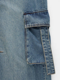 Vintage wash wide leg cargo jeans by Trendsi featuring relaxed fit, large side pockets, and distressed details.