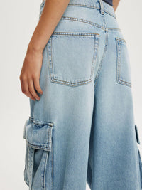 Vintage Wash Wide Leg Cargo Jeans from Trendsi, showing relaxed fit with large side pockets and faded denim finish.