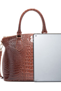 Trendsi PU leather handbag with double handles, gold-tone hardware, and spacious interior, stylish for everyday use.