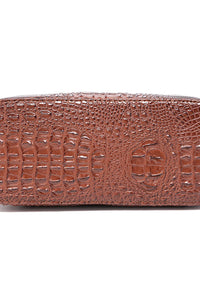 Trendsi PU leather handbag with sleek design and silver hardware, featuring dual top handles and a spacious interior.