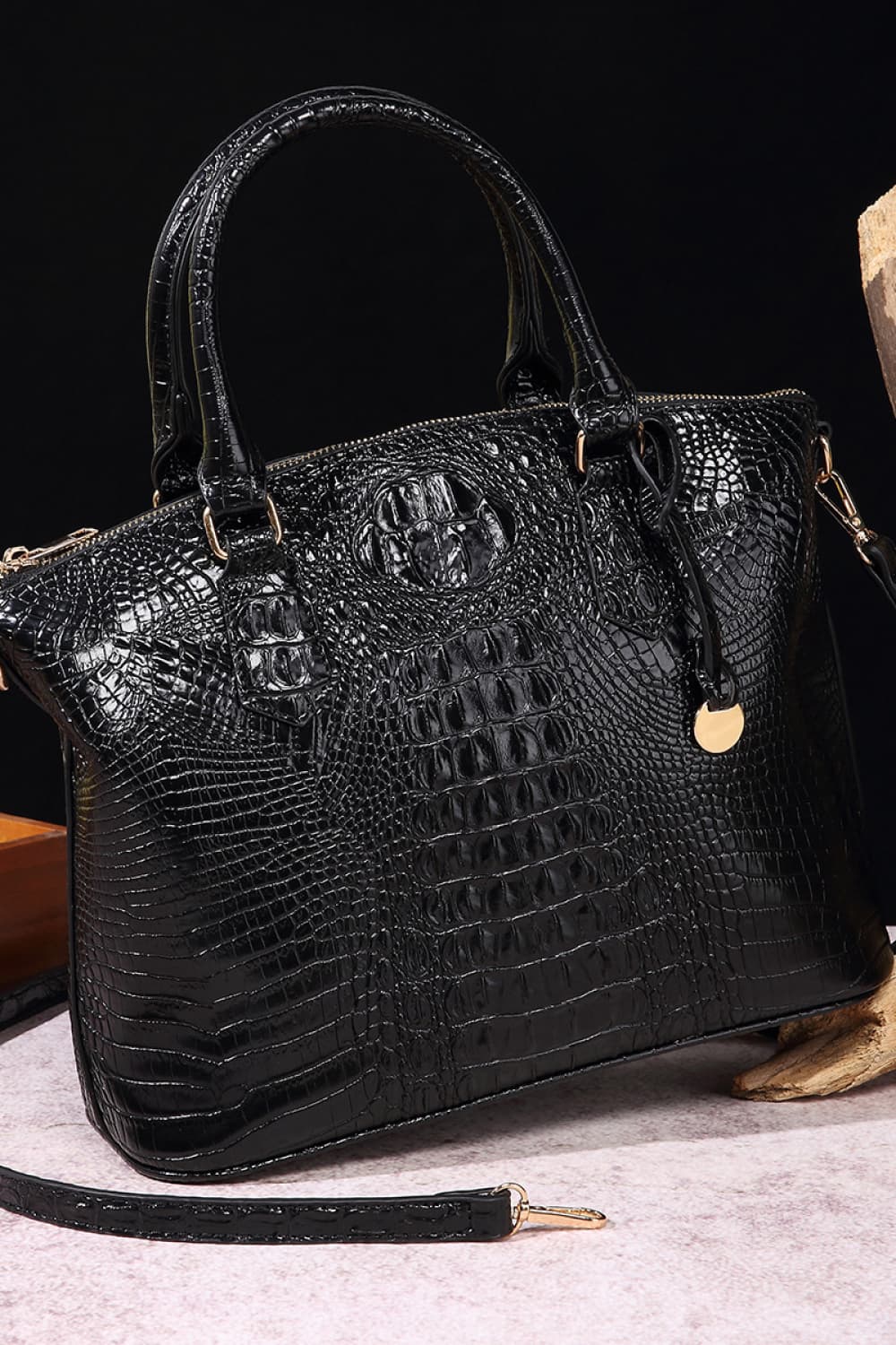 Trendsi PU leather handbag with structured design, top handles, and silver hardware on a neutral background.