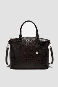 Trendsi PU leather handbag with silver hardware, featuring a structured design and top handle for stylish everyday use.