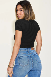Dark brown Trendsi Basic Bae full-size ribbed round neck short sleeve T-shirt, close-up of fabric and fit on model
