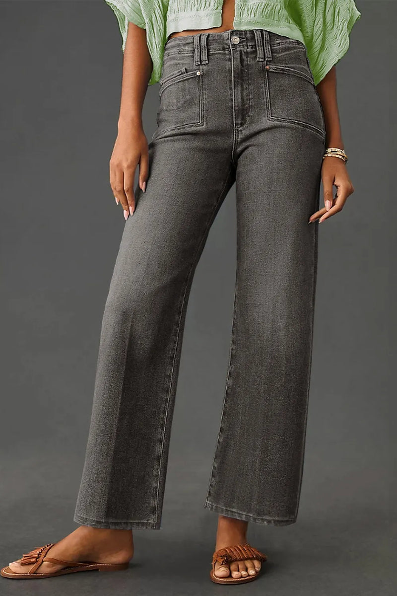 High-waisted wide-leg vintage wash jeans by Trendsi displayed on a model, showing relaxed fit and retro denim style.