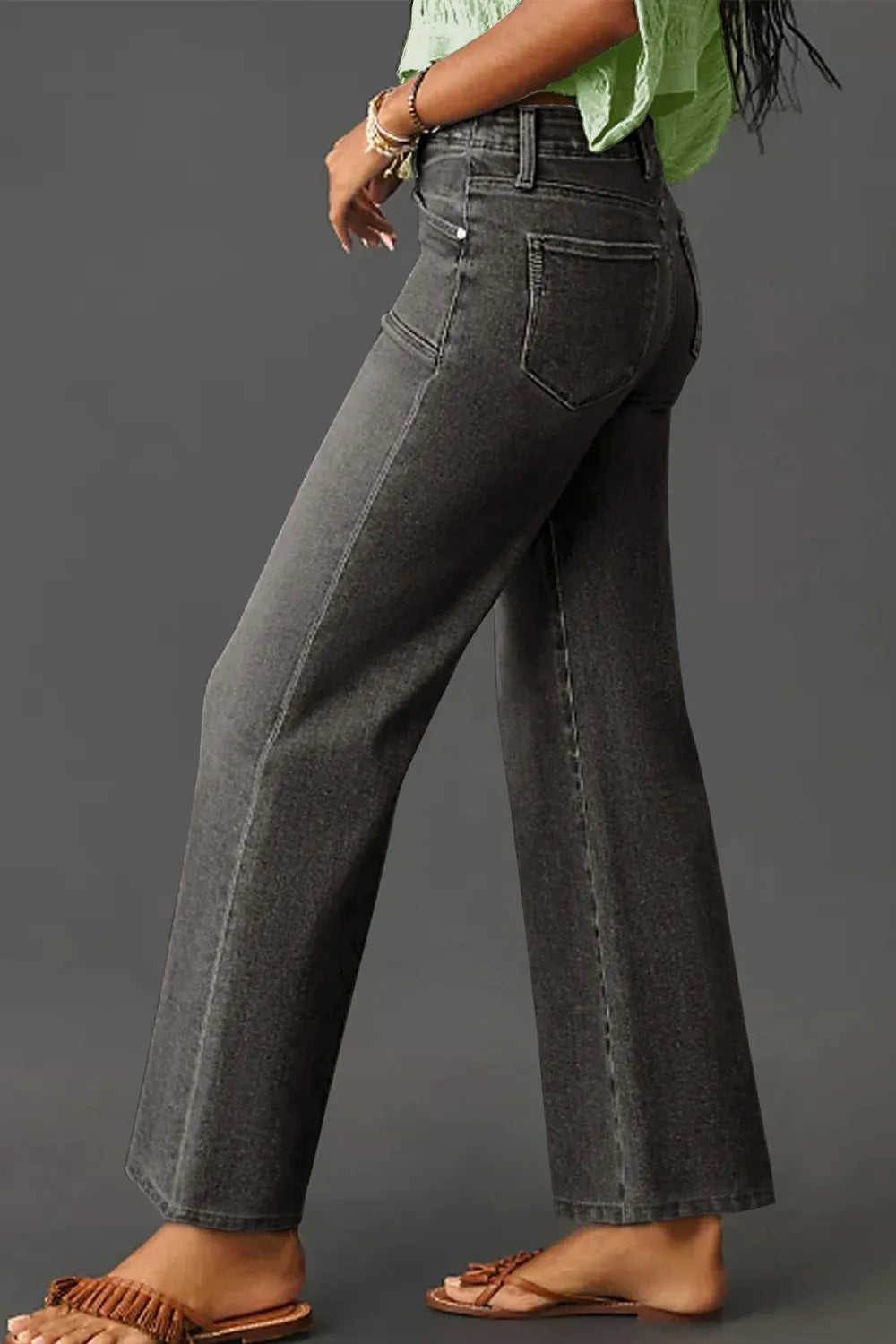 Vintage wash high-waisted wide-leg jeans from Trendsi, showcasing the relaxed fit and classic denim style.