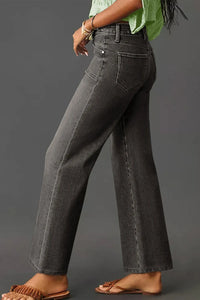 Vintage wash high-waisted wide-leg jeans from Trendsi, showcasing the relaxed fit and classic denim style.