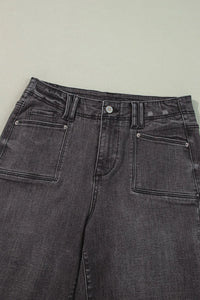 High-waisted wide-leg vintage wash jeans from Trendsi featuring classic denim texture and relaxed fit.