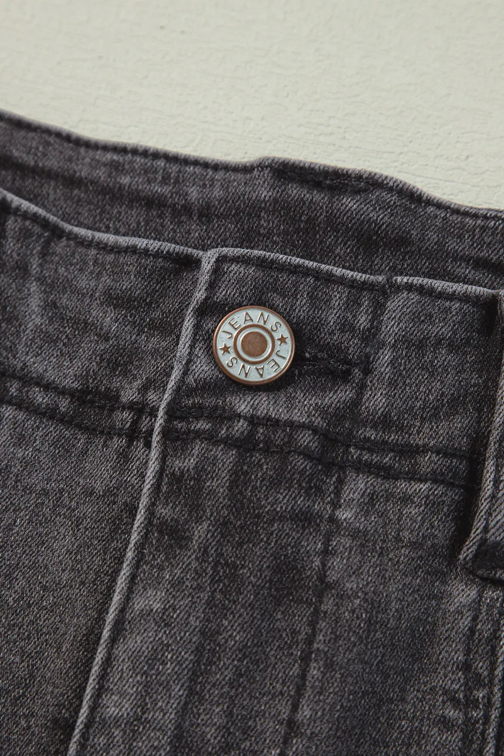 High-waisted vintage wash wide-leg jeans from Trendsi, shown on a model with a relaxed fit and classic denim style.