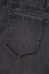 High-waisted vintage wash wide-leg jeans from Trendsi, showing the relaxed fit and classic denim texture.