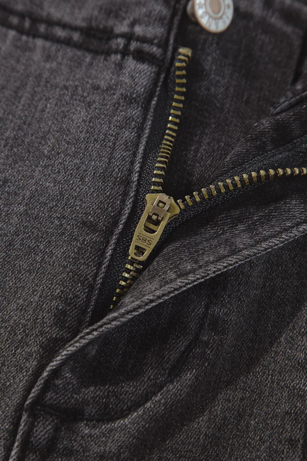 Vintage wash high-waisted wide-leg jeans by Trendsi, showing a relaxed fit with faded denim and classic pocket details.