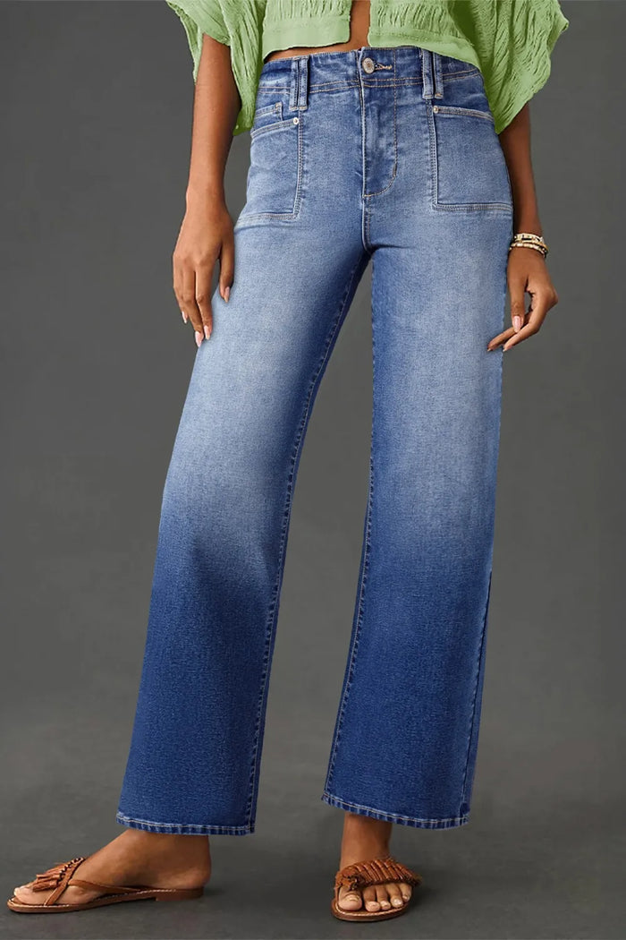 High-waisted wide-leg vintage wash jeans by Trendsi, showcasing relaxed fit, faded denim, and classic vintage style.