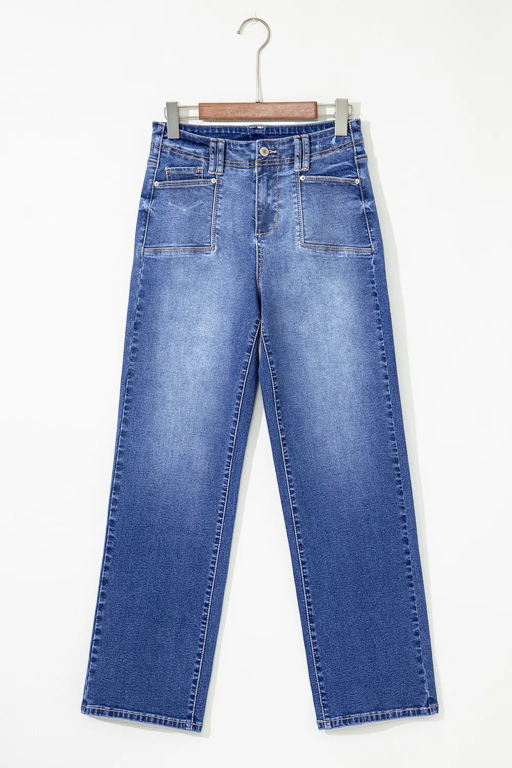 High-waisted wide-leg vintage wash jeans from Trendsi, featuring a relaxed fit and classic denim style.