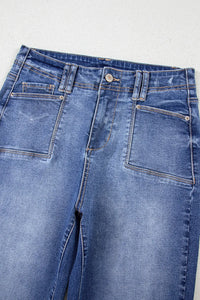 High-waisted wide-leg vintage wash jeans by Trendsi, showcasing classic fit and faded denim style.