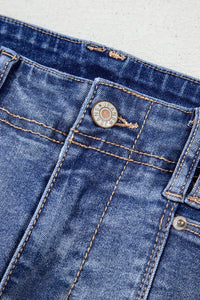 High-waisted wide-leg vintage wash jeans from Trendsi displayed on a model, showcasing relaxed fit and classic denim style.