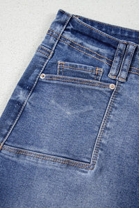 High-waisted wide-leg vintage wash jeans from Trendsi with relaxed fit and classic denim style, shown on a model.