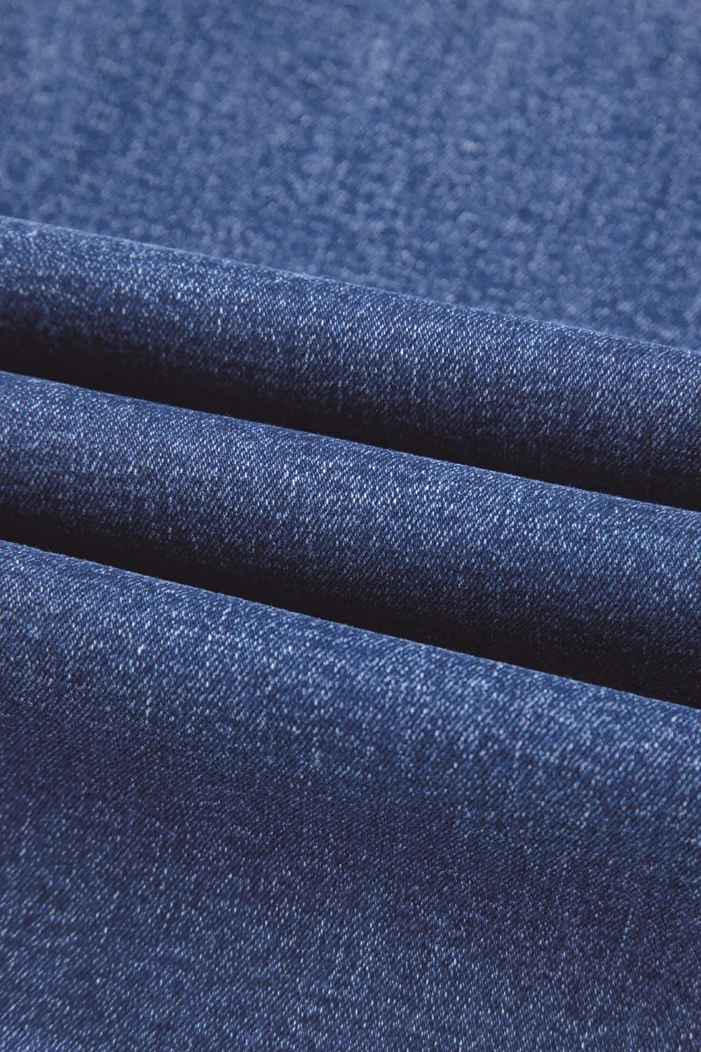 Vintage wash high-waisted wide-leg jeans by Trendsi, showing the relaxed fit and classic denim style.