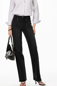 High-waisted wide-leg vintage wash jeans from Trendsi displayed on a model, showing fitted waist and flowing pant legs.