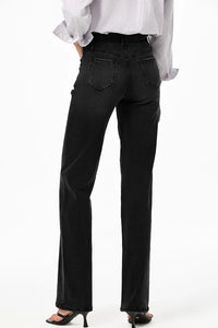 High-waisted wide-leg vintage wash jeans from Trendsi, featuring a relaxed fit and classic denim style.