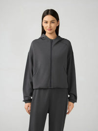 Trendsi Millennia zip-up hoodie with dropped shoulders and active fit, featuring a hood and full zipper in a stylish casual design.