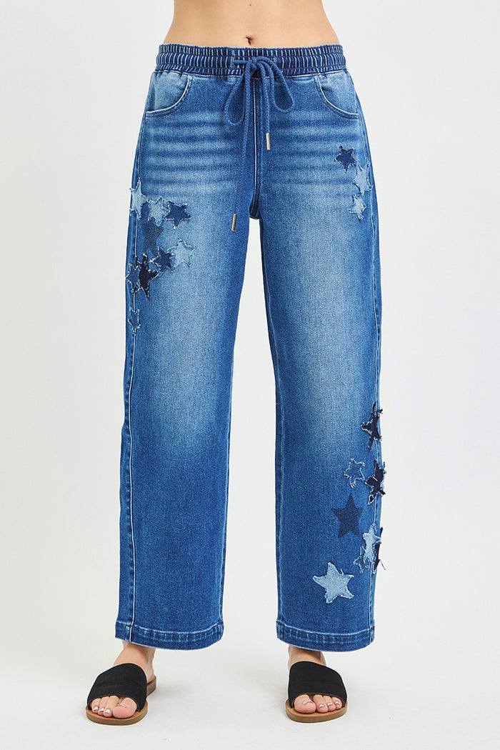 Dark gray RISEN elastic band slouchy cropped barrel pants with star patch, trendy casual style.