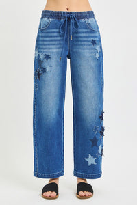 Dark gray RISEN elastic band slouchy cropped barrel pants with star patch, trendy casual style by Trendsi.