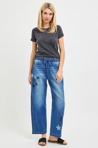 Dark gray RISEN elastic band slouchy cropped barrel pants with star patch, stylish trendy casual wear.