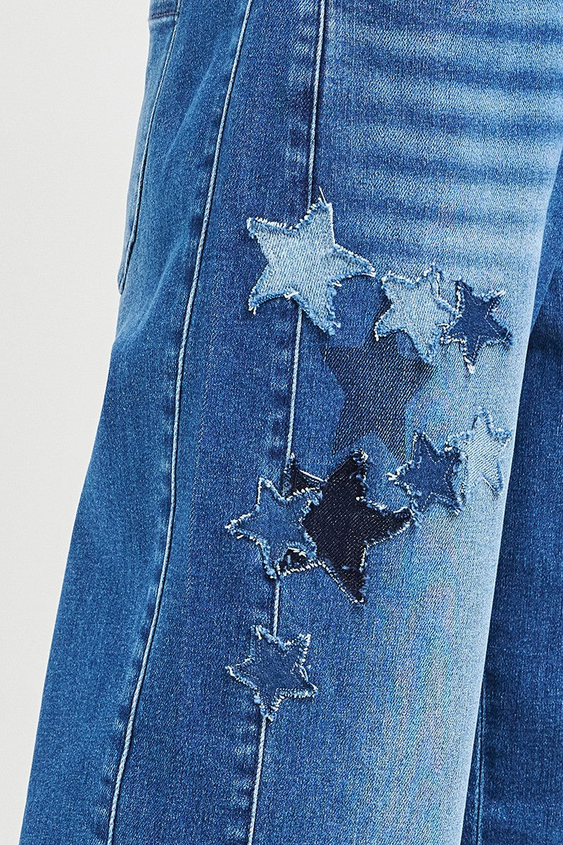 Dark RISEN elastic band slouchy cropped barrel pants with star patch from Trendsi, showing the relaxed fit and stylish detail.