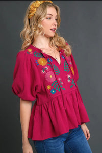 Plus size Umgee floral embroidery cotton gauze babydoll blouse with full sleeves and delicate embroidery details.