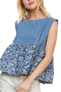 Sleeveless denim contrast top from ADORA by Trendsi, featuring a stylish design with contrasting fabric details.